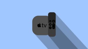 Illustration of an Apple TV mount with a black Apple TV box and matching remote control, set against a light blue background with a long shadow indicating ambient light from the upper left side.