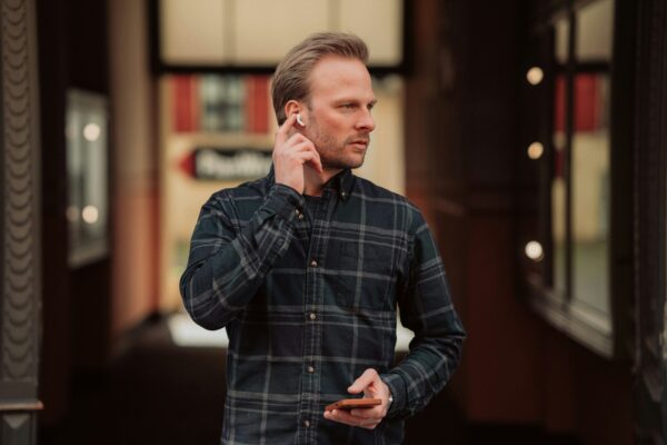 a man is talking on his cell phone