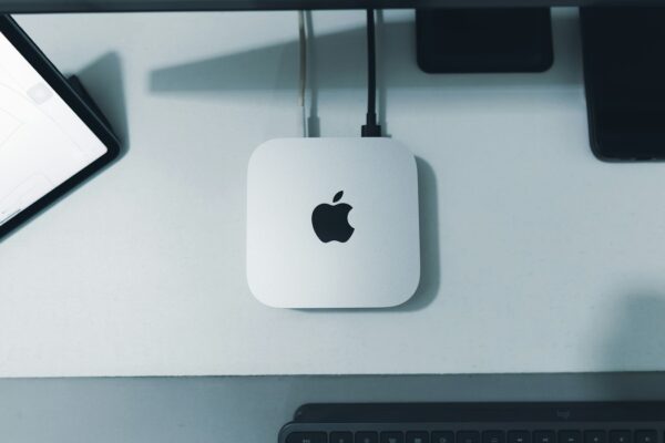 An apple computer sitting on top of a desk