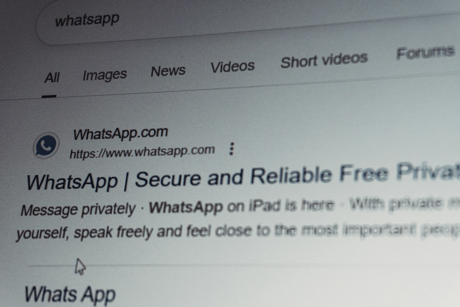 Whatsapp search results on a computer screen.