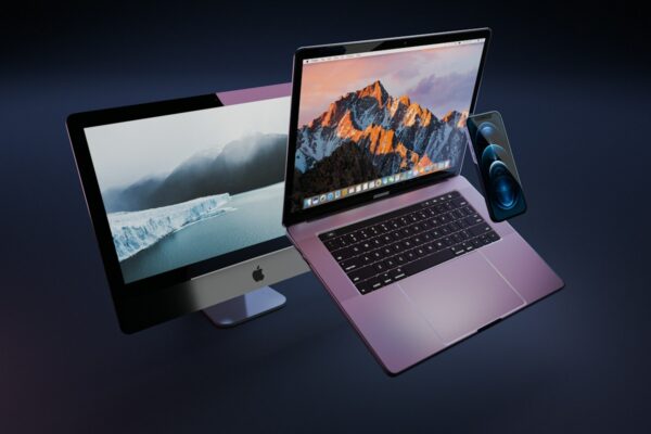 macbook pro on white table