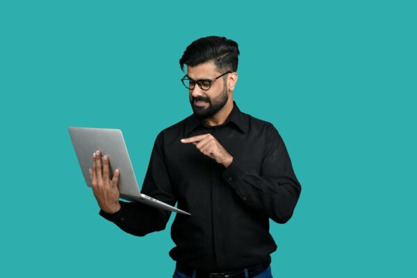 a man holding a tablet