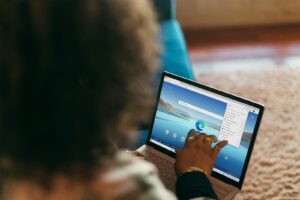 person using Surface laptop